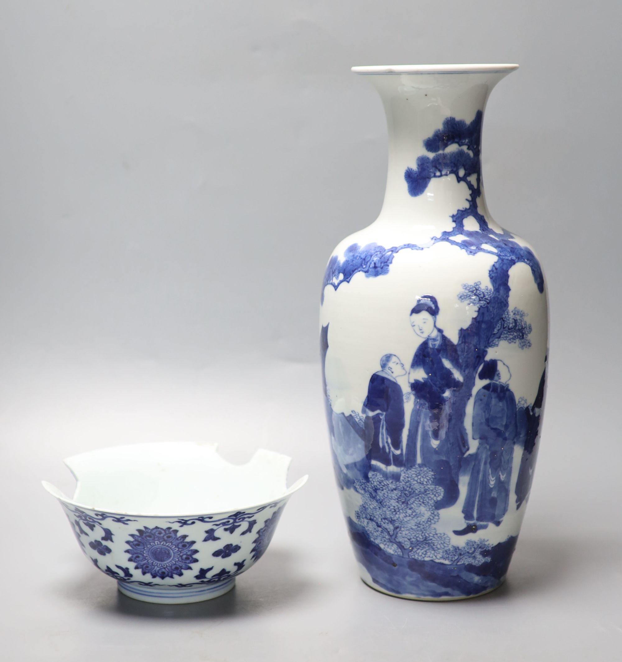 A Chinese blue and white vase, Kangxi mark, c.1900, 36cm and a similar bowl, Qianlong seal mark, early 20th century, 18.5cm